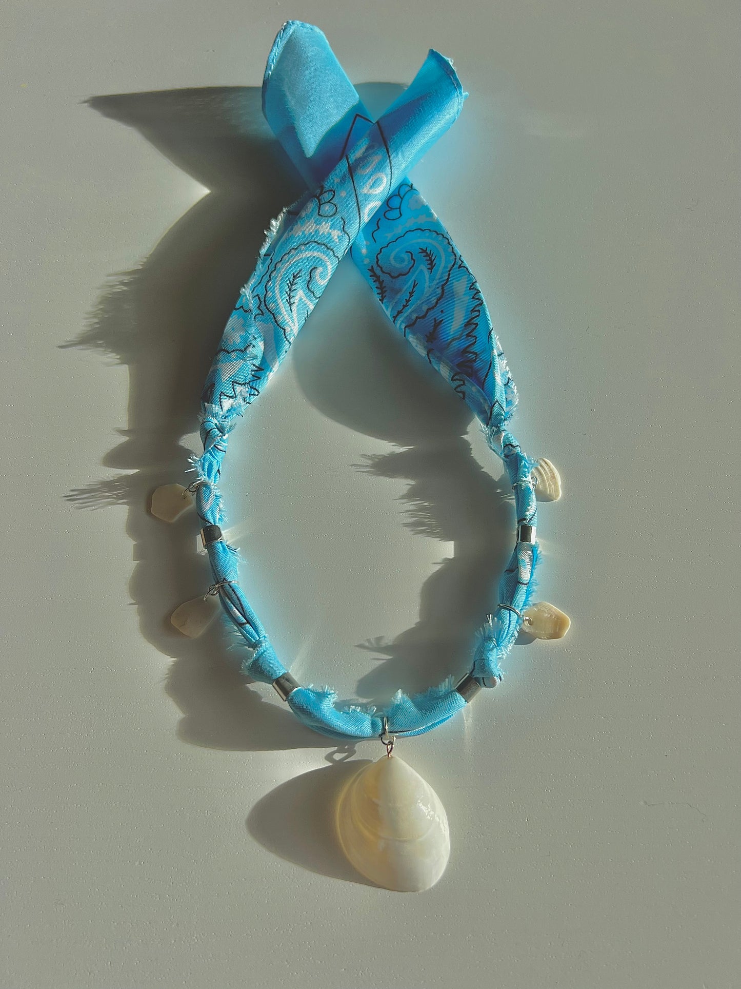 Handmade Light Blue Bandana Shell Necklace – Silver Details
